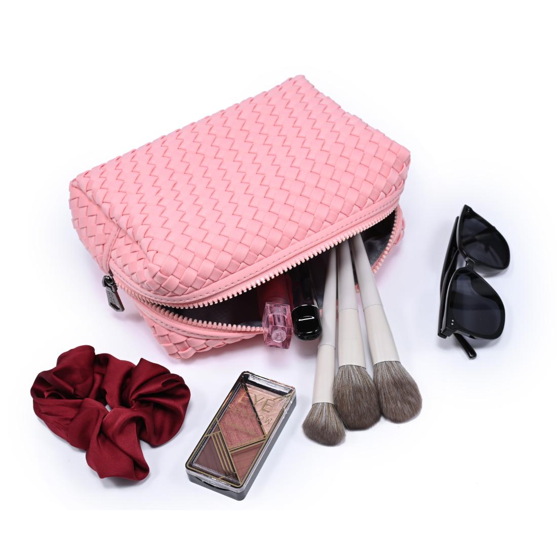 Woman wearing Blush Sol and Selene Altitude - Woven Neoprene Cosmetic & Travel Organizer Pouch 841764112383 View 1 | Blush
