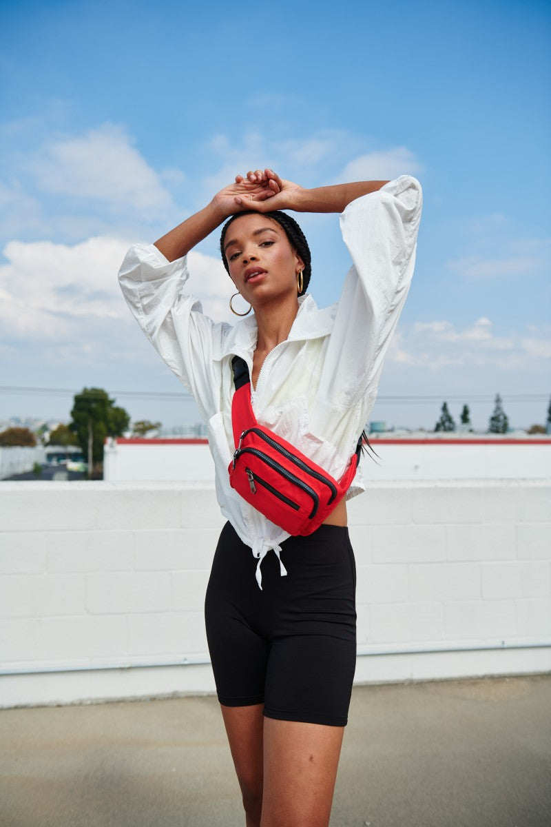 model wearing a Sol and Selene belt bag