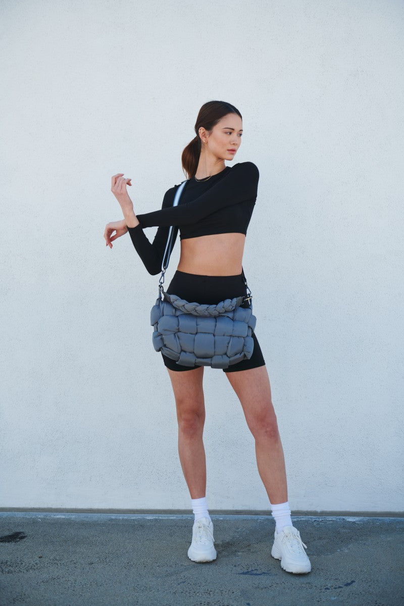 model wearing a Sol and Selene crossbody bag