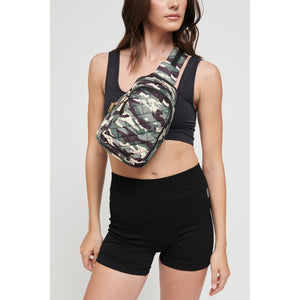Woman wearing Green Camo Sol and Selene On The Run Sling Backpack 841764105965 View 3 | Green Camo