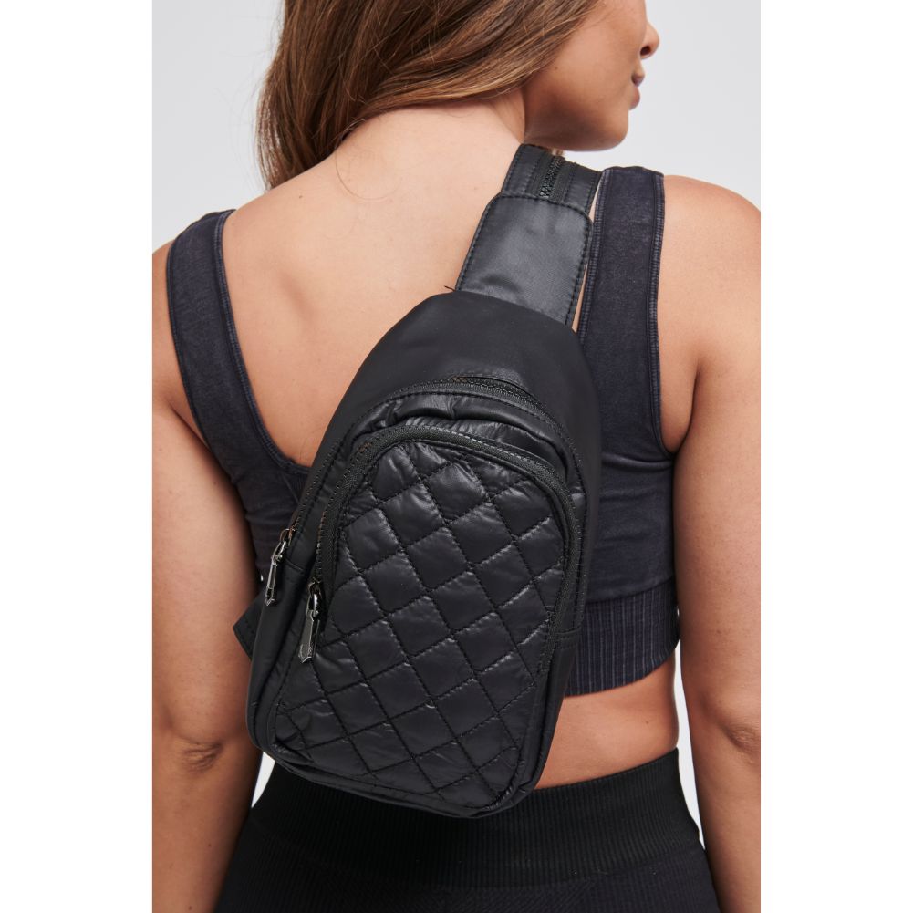 Woman wearing Black Sol and Selene On The Run Sling Backpack 841764104401 View 2 | Black