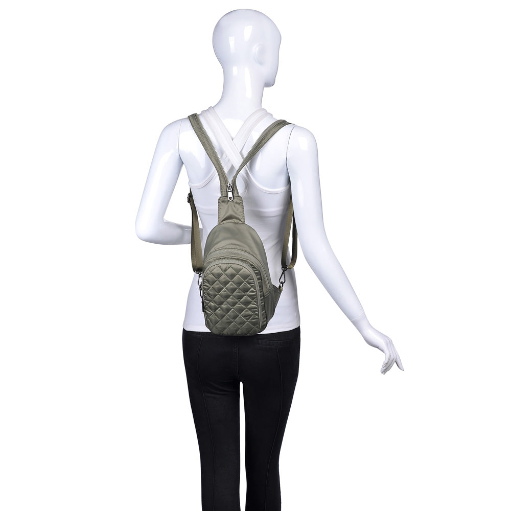 Woman wearing Light Olive Sol and Selene On The Run Sling Backpack 841764104449 View 1 | Light Olive