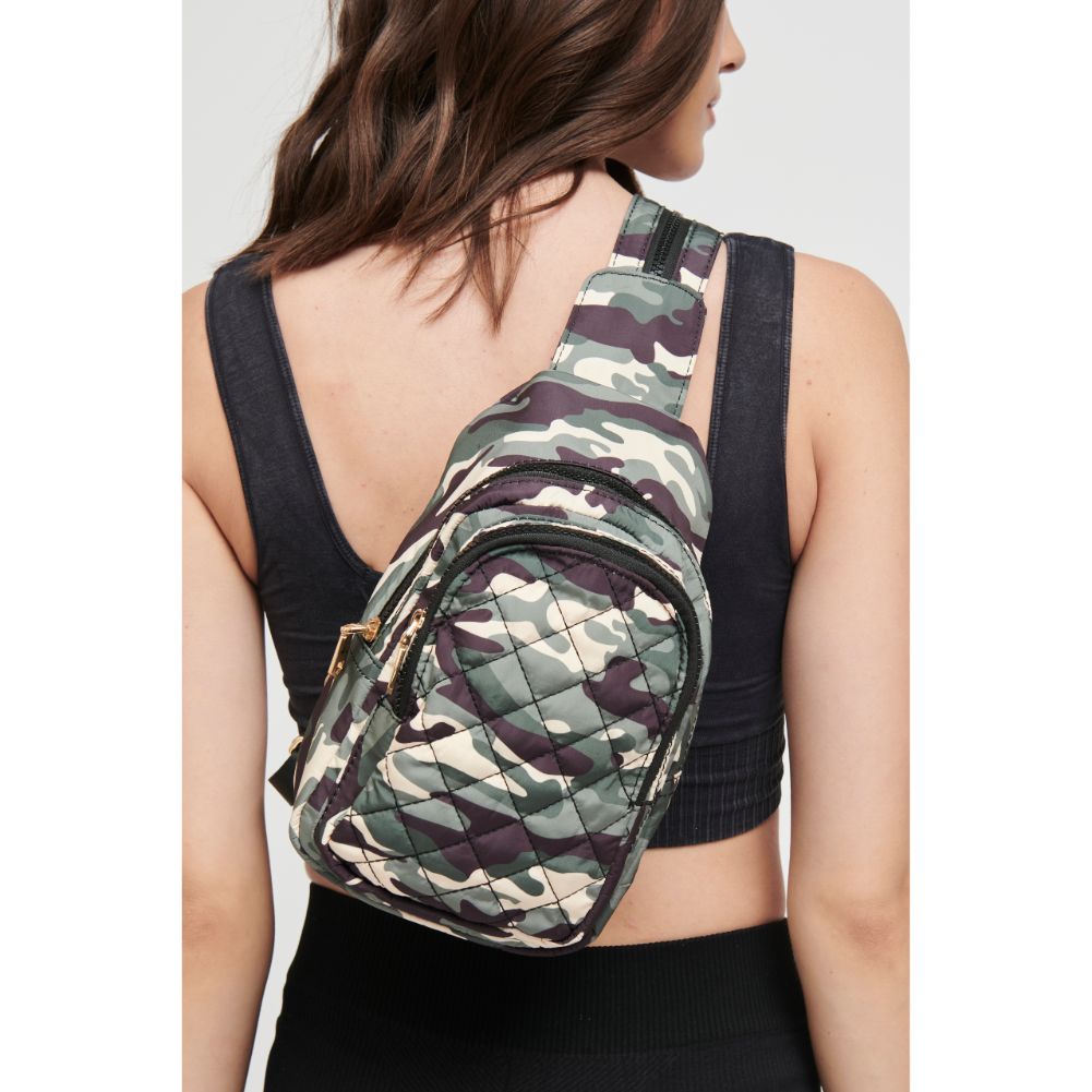 Woman wearing Green Camo Sol and Selene On The Run Sling Backpack 841764105965 View 2 | Green Camo