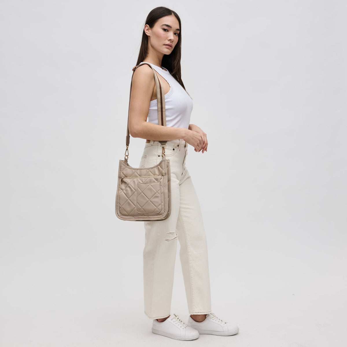 Woman wearing Nude Sol and Selene Motivator Messenger Crossbody 841764107518 View 2 | Nude