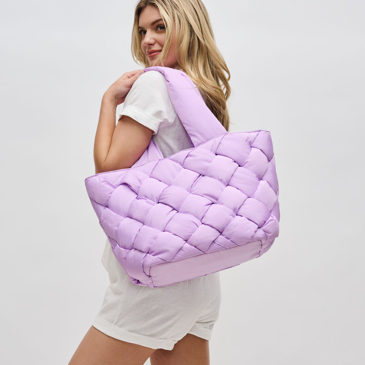 Woman wearing Lilac Sol and Selene Intuition East West Tote 841764107884 View 2 | Lilac