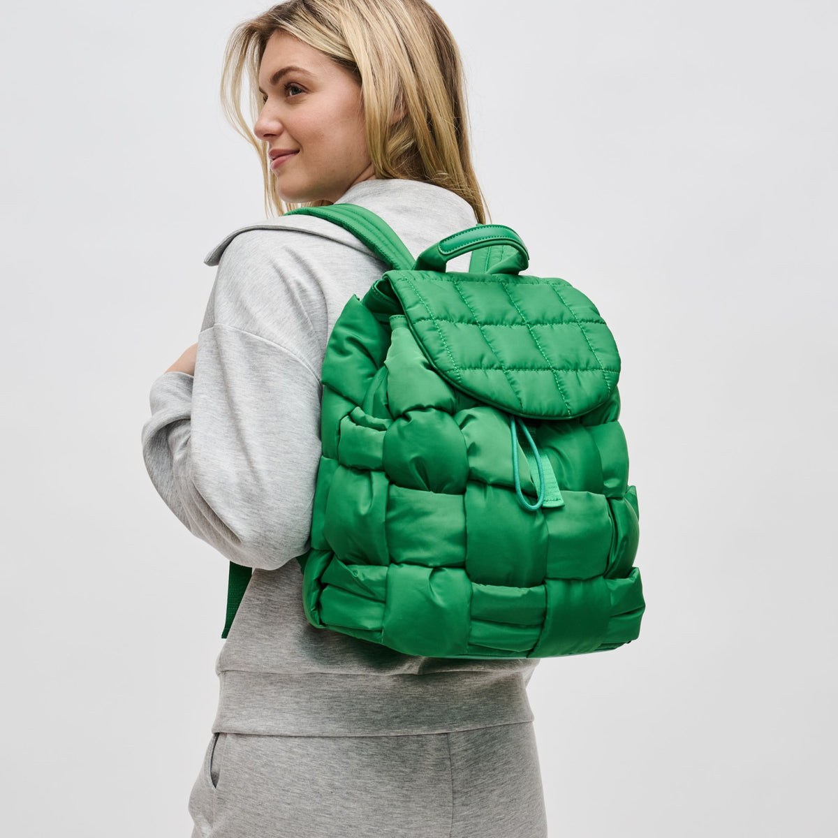 Woman wearing Kelly Green Sol and Selene Perception Backpack 841764107952 View 2 | Kelly Green