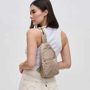 Woman wearing Nude Sol and Selene Motivator Sling Backpack 841764107549 View 2 | Nude