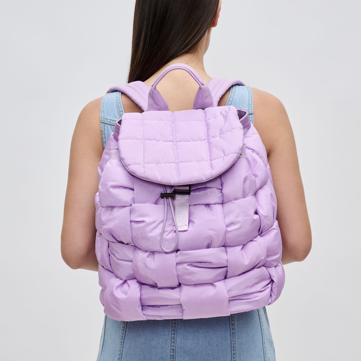 Woman wearing Lilac Sol and Selene Perception Backpack 841764107969 View 1 | Lilac