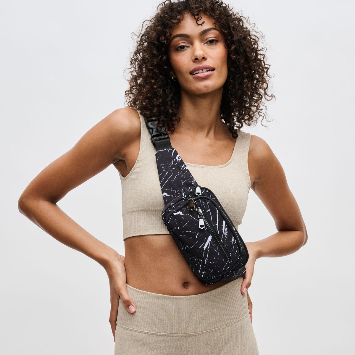 Woman wearing Black Marble Sol and Selene Hip Hugger Belt Bag 841764105804 View 1 | Black Marble