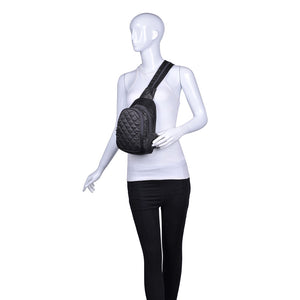 Woman wearing Charcoal Sol and Selene On The Run Sling Backpack 841764104425 View 2 | Charcoal