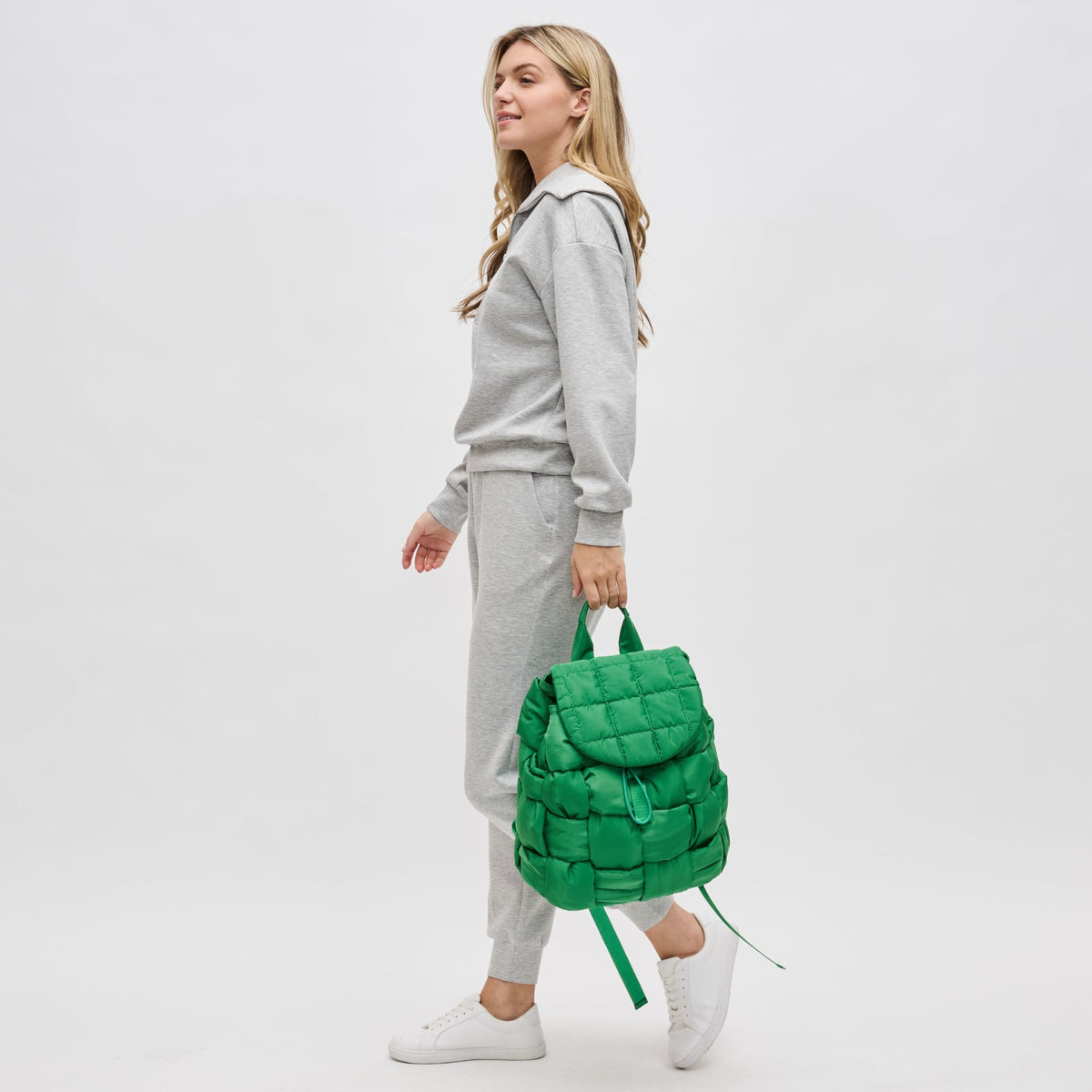 Woman wearing Kelly Green Sol and Selene Perception Backpack 841764107952 View 4 | Kelly Green