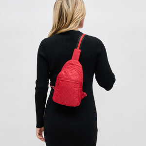 Woman wearing Red Sol and Selene Motivator Sling Backpack 841764107938 View 2 | Red