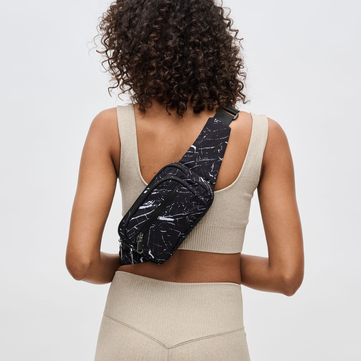 Woman wearing Black Marble Sol and Selene Hip Hugger Belt Bag 841764105804 View 3 | Black Marble