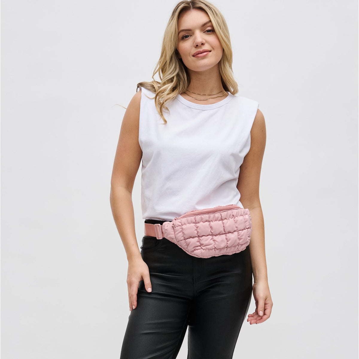 Woman wearing Rose Sol and Selene Resurgence Belt Bag 841764109680 View 1 | Rose