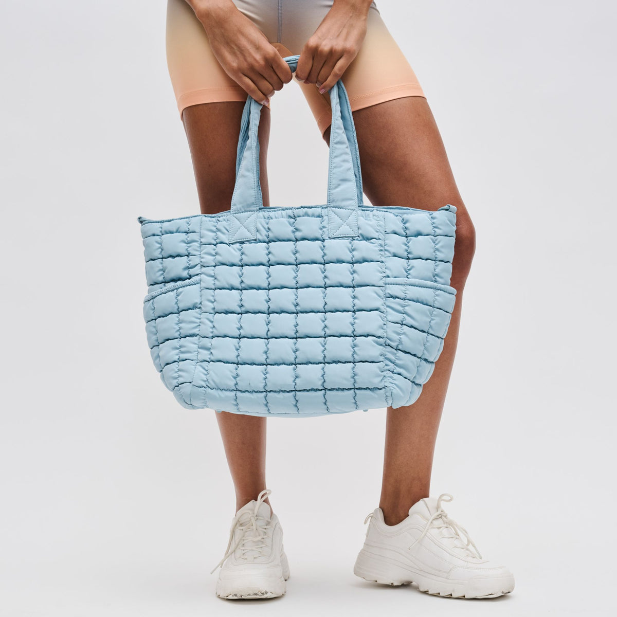 Woman wearing Sky Blue Sol and Selene Dreamer Tote 841764109468 View 4 | Sky Blue