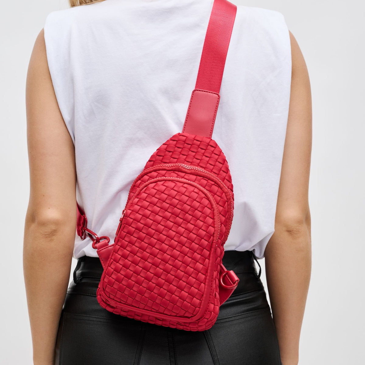 Woman wearing Red Sol and Selene Beyond The Horizon - Woven Neoprene Sling Backpack 841764108072 View 4 | Red