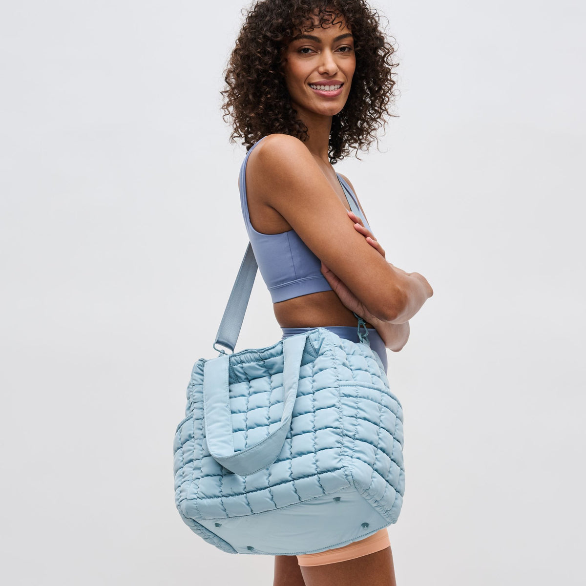 Woman wearing Sky Blue Sol and Selene Dreamer Tote 841764109468 View 2 | Sky Blue